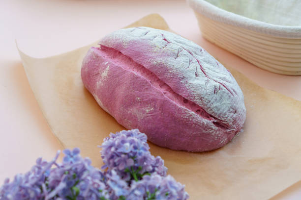 Unusual purple sourdough bread and proofing basket for home made sourdough bread. Unusual purple sourdough bread and proofing basket for home made sourdough bread. proofing baskets stock pictures, royalty-free photos & images
