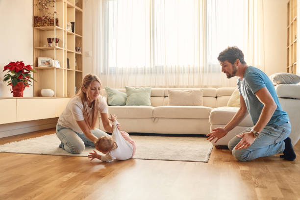 istock First steps of baby, and falling down! 2154998517