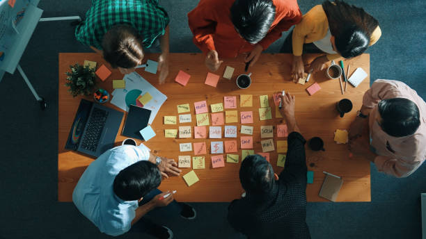 istock Top view of smart business team working together and clapping hand. Convocation. 2154998712