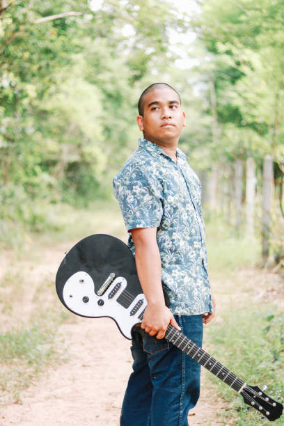 istock Thai male guitarist 2154999274