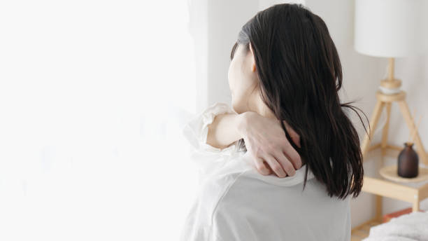 istock Women suffering from dry skin 2154999755