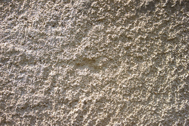 Old uneven crumbling brick, wall - background, close-up