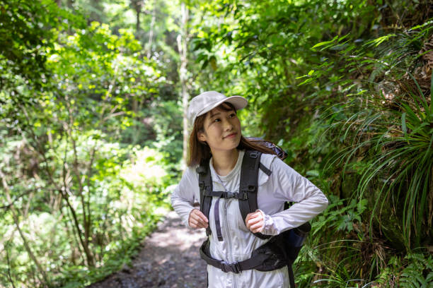 istock Female hiker walking up mountain 2155001952