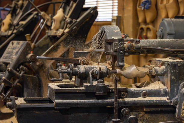 istock making classic Dutch clog at the factory 2155003171
