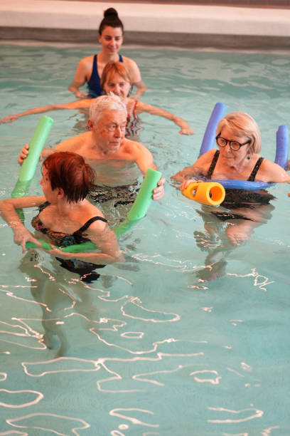 istock Parkinson Disease patient exercises walking, as disease therapy 2155003988