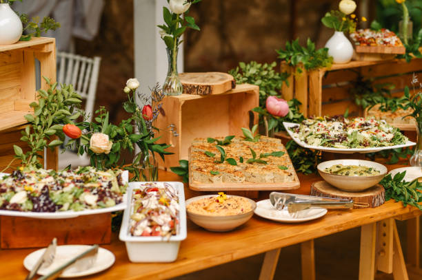 istock Buffet food for party decorated with fresh plants. 2155009031