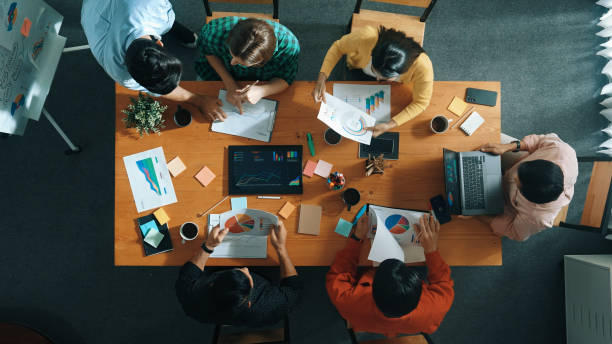 istock Top view of smart businessman present marketing idea at meeting. Convocation. 2155015775