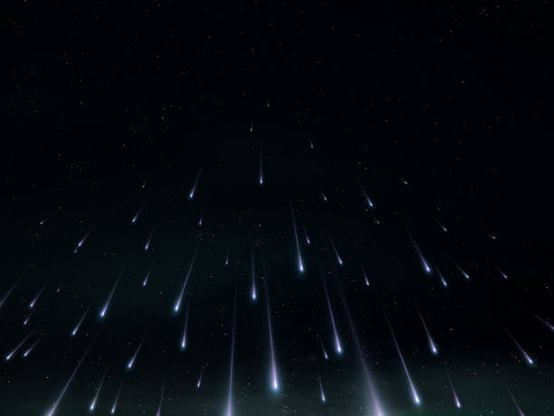 istock Starfall on a black background. Fireballs in the sky. 2155021969