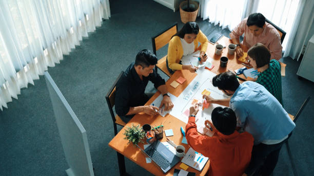 istock Top view of diverse people brainstorming and making task board. Convocation. 2155022148