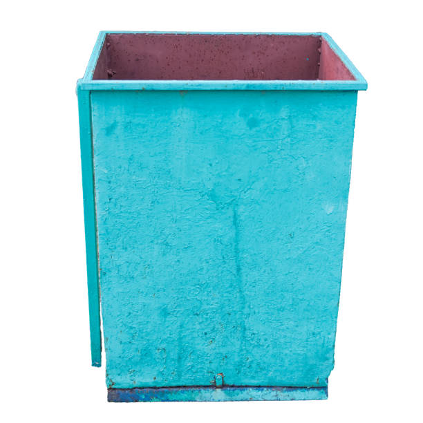 Green metal street trash can isolate on a white background close-up.