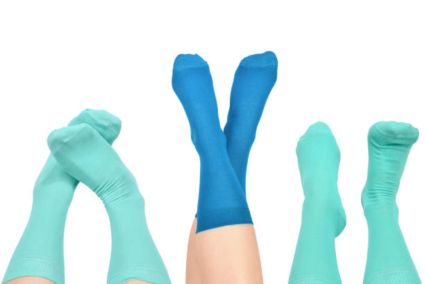 istock Woman in blue socks isolated on white background. Top view. 2155028907