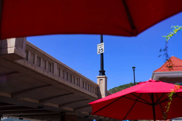 istock Layered View of Red Umbrellas Under Road Overpass 2155029297