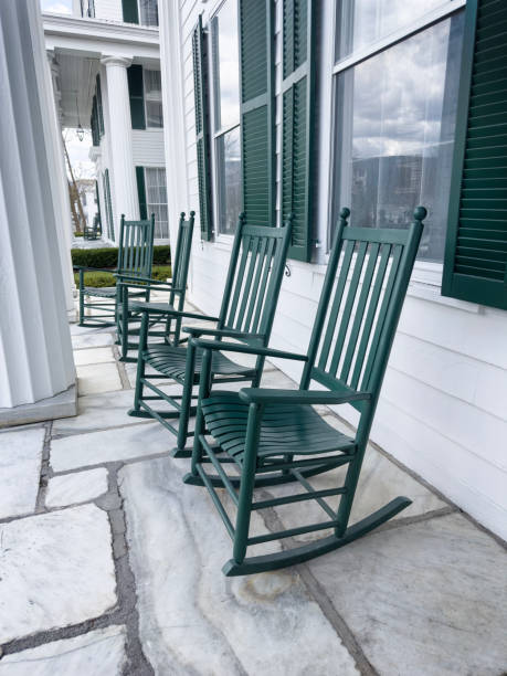 istock Front porch with rocking chairs 2155032246