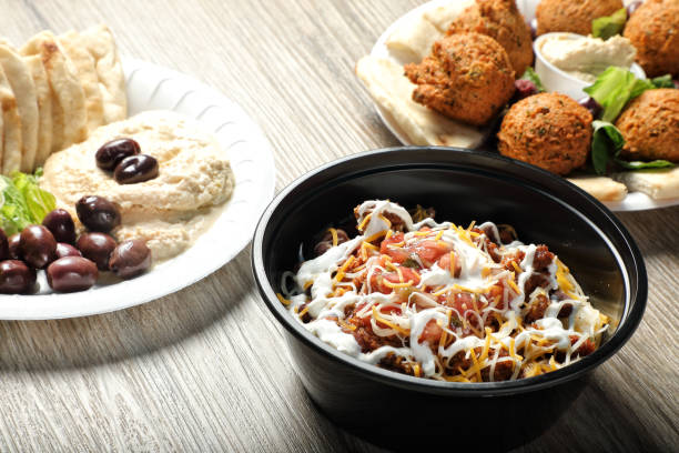 istock Group of various food dishes on restaurant table 2155036775