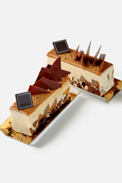istock Two mousse desserts with chocolate streusel, spiced pears and caramel 2155039766