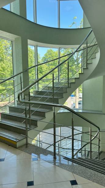 istock The staircase in the building is spiral. Interior Design 2155040483