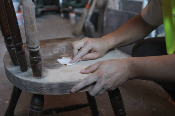 istock Manual wood sanding in the workshop 2155040584