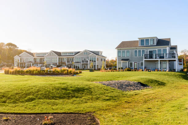 istock Houses under construction in a new development in the countryside under clear sky at sunset in autumn 2155043037