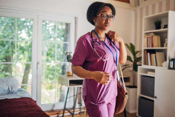 istock Compassionate healthcare professional in modern home setting 2155043199