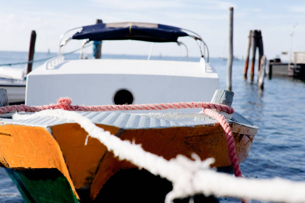Hanging buoys on fishing boat.