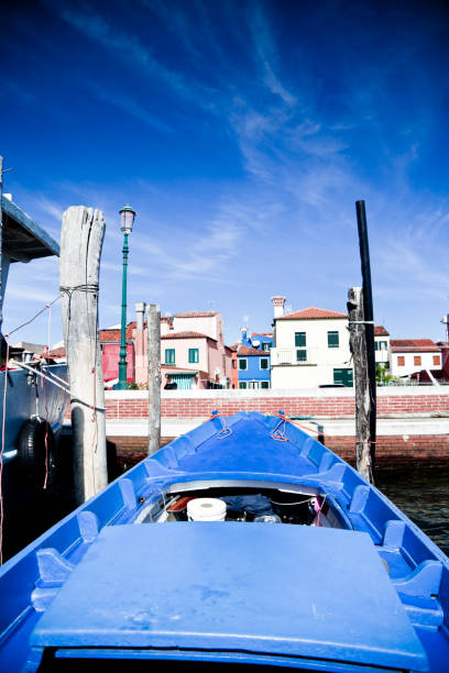 Pellestrina - Venice, Italy - May 26, 2024. Old fishing boat  in Venetian Lagoon.