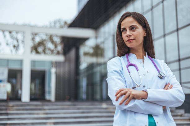 istock Confident Female Doctor in White Coat 2155050619