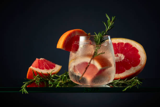istock Cocktail gin tonic with ice, grapefruit, and rosemary. 2155052157