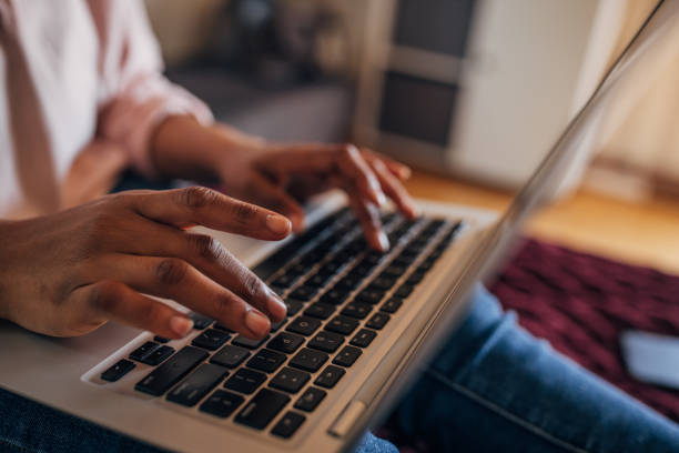 istock Close-up of hands typing on laptop 2155054555