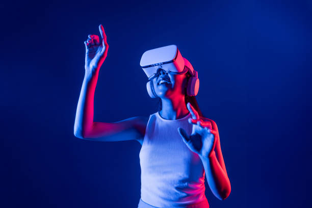 istock Elegant female connect metaverse use finger point virtual object. Hallucination. 2155058646