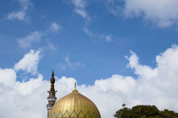 istock Serene sanctuary Golden Dome and Minaret. 2155058986