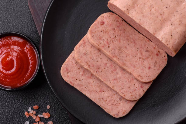 istock Delicious canned pink ham with salt, spices and herbs 2155060096