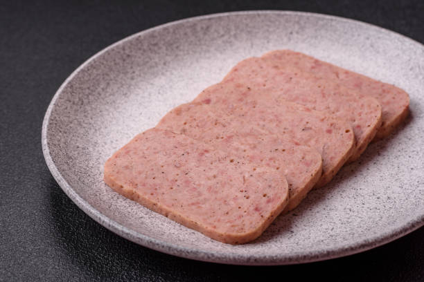 istock Delicious canned pink ham with salt, spices and herbs 2155060101