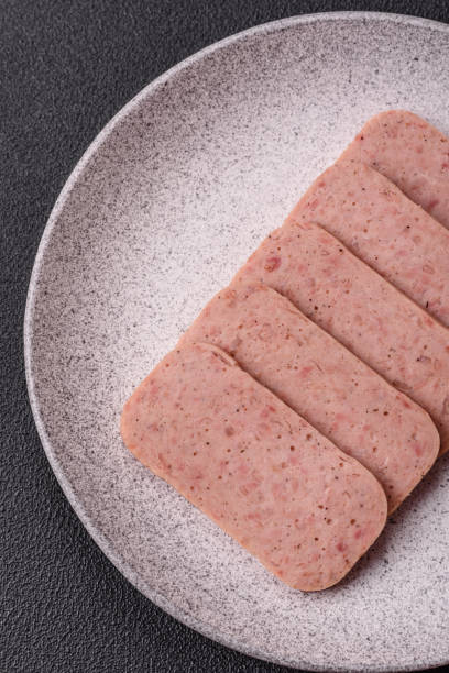 istock Delicious canned pink ham with salt, spices and herbs 2155060109