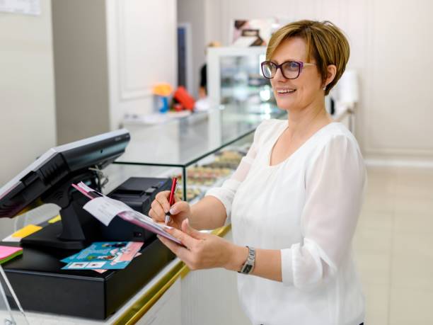 istock Proud confectioner is working in her pastry shop 2155060588