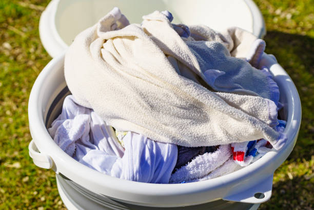 istock Washing laundry on holidays trip. 2155061507