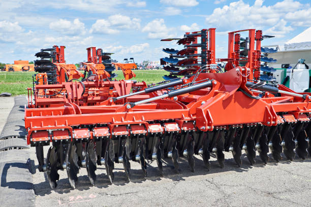 istock Trailed in-line disc harrow at agricultural exhibition 2155065462