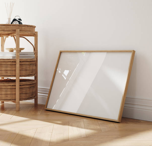 istock Mock up frame in home interior background, white room with natural wooden table and decor 2155066036