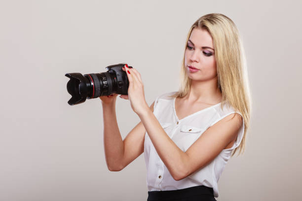 istock Beautiful woman with camera. 2155066390