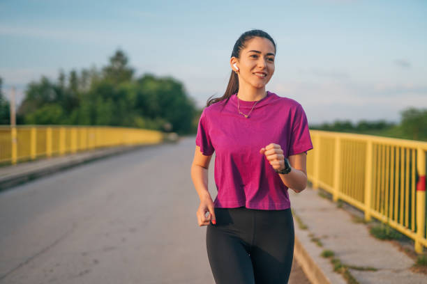 istock young woman exercising outside 2155068857