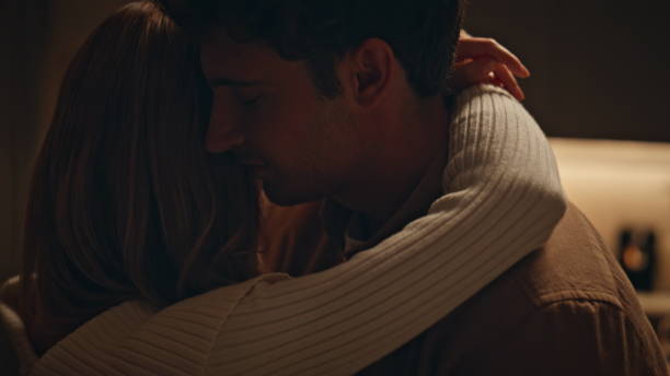 istock Loving couple dancing home spending romantic evening together close up. 2155075799