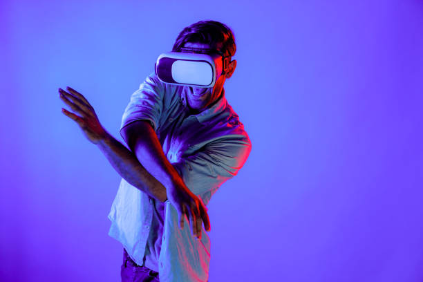 istock Happy man dancing and moving gesture to music by using VR glasses. Deviation. 2155077747