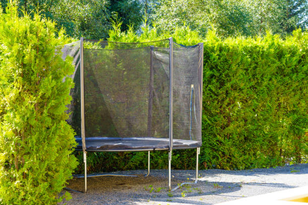 istock Trampoline for children in garden 2155079503