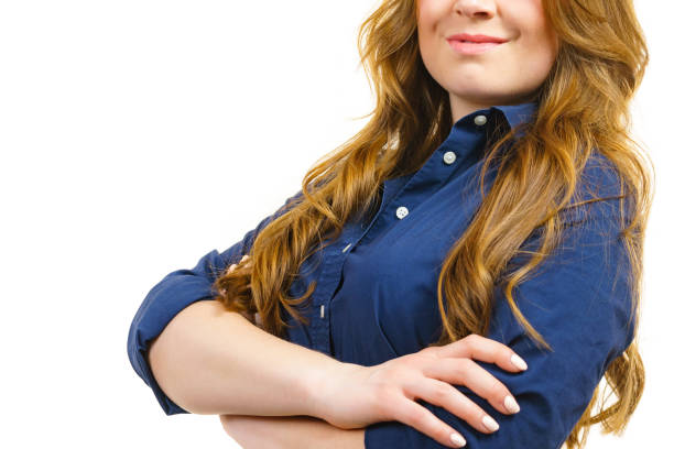 istock Woman standing with arms folded 2155080445
