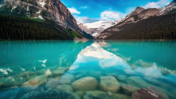 istock Scenic Lake Louise Alberta Canada Surrounded by Mountains Under Blue Sky 2155080652