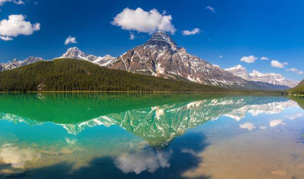 istock Mountain Range Reflecting in Still Water of Lake 2155080717
