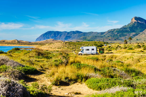 istock Spanish coast with caravan camping in the distance 2155080979