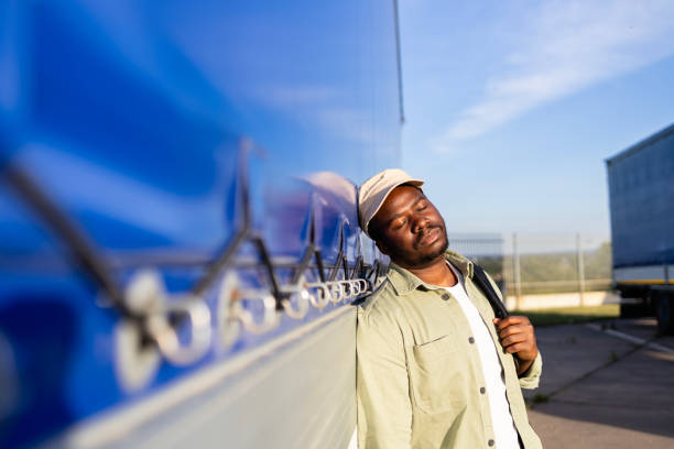 istock Exhausted truck driver coming to work. 2155083726