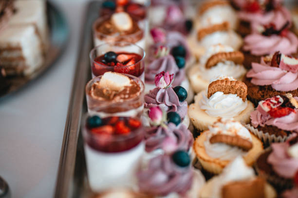 istock Dessert table with all kinds snacks. Candy bar. Celebration concept. 2155084436