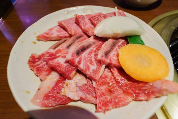 istock fresh meat and vegetables in white plate 2155096897