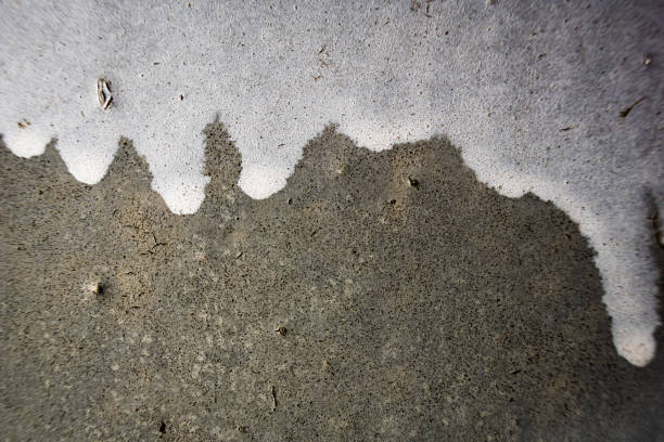 istock Close Up of white paint on a metal wall 2155097119